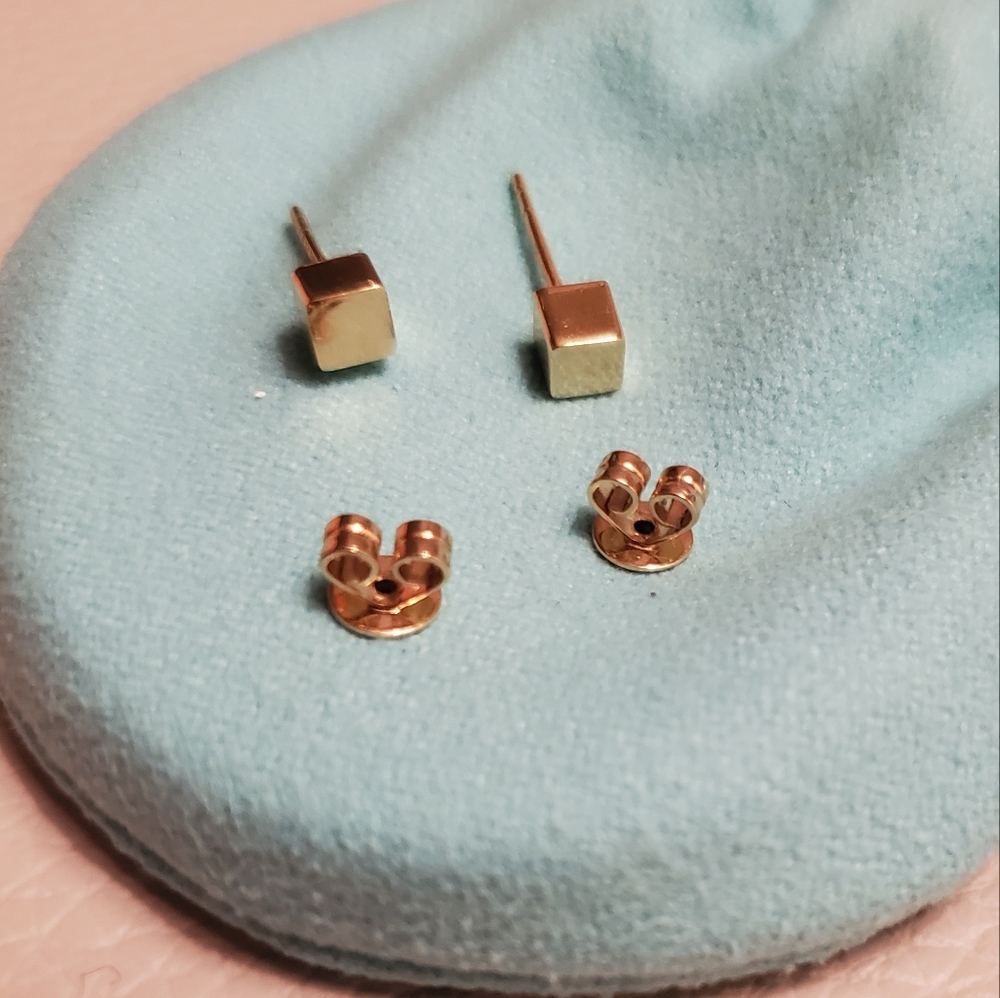 Solid 14k cube post earrings with butterfly backs.